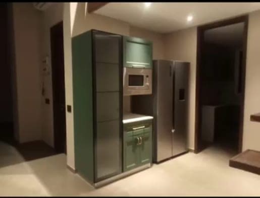 Sage green modular kitchen design MANKU